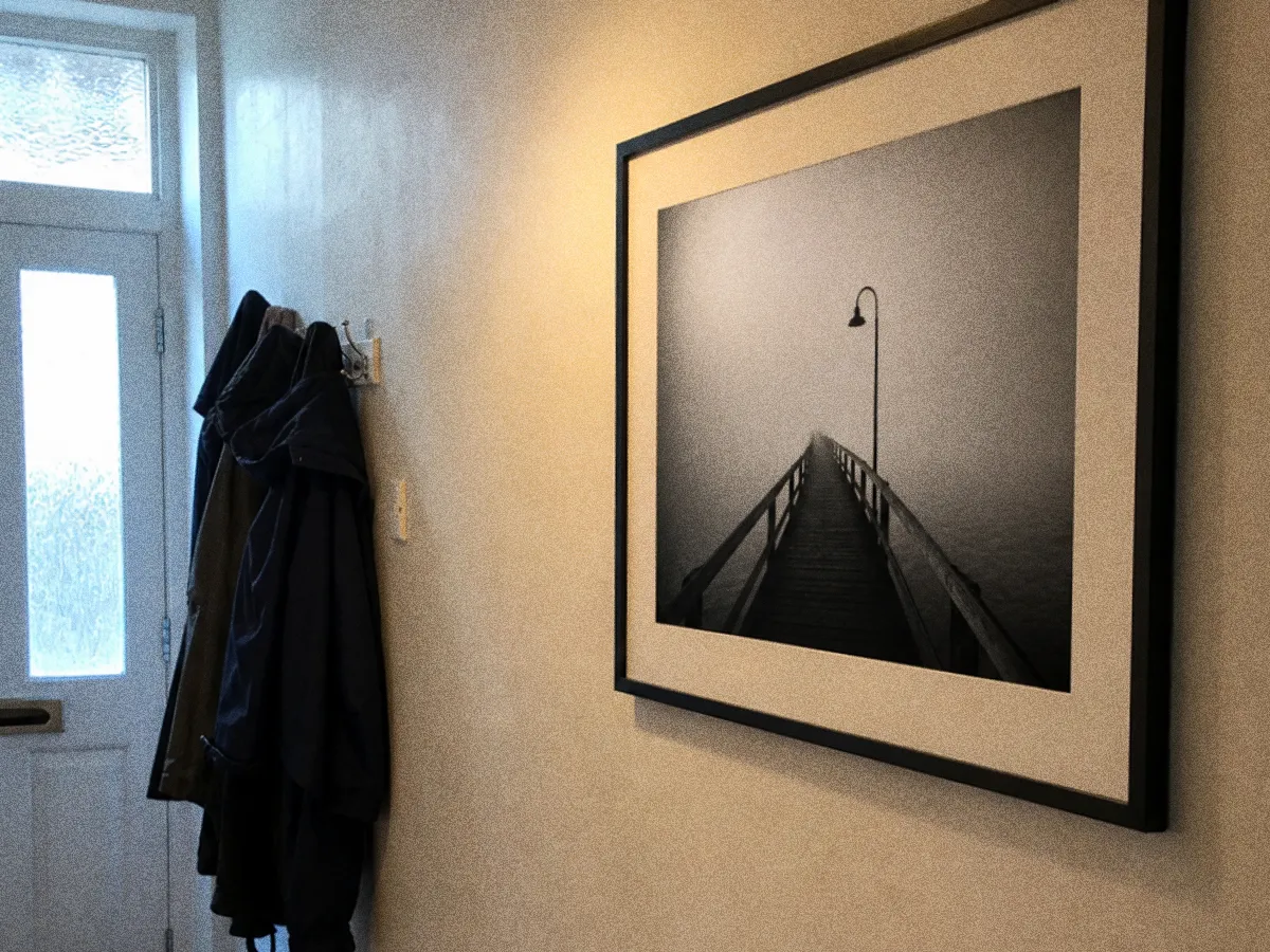 Framed print, 20 × 16 in, in a hallway
